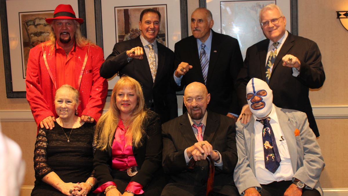 Michael Hayes, Rick Martel, Dominic Denucci, JJ Dillon, Joyce Grable, Wendi Richter, Butcher Vachon and The Destroyer (Dick Beyer) at the 2015 Pro Wrestling Hall of Fame induction in Johnstown, NY. Photo by Andrea Kellaway, www.andreakellaway.com