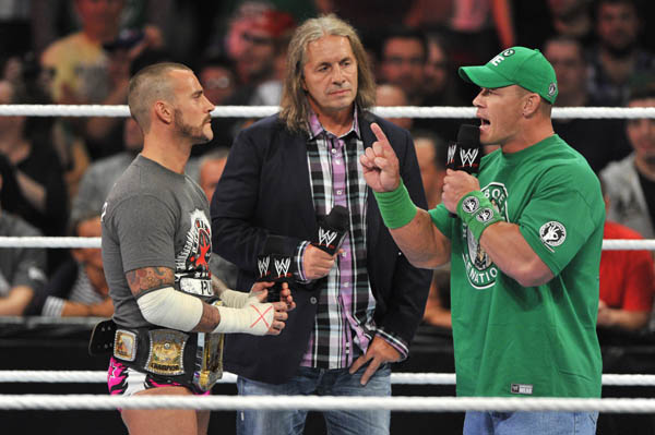 Bret Hart, with CM Punk and John Cena in the Bell Centre in Montreal in September 2012. Photo by Minas Panagiotakis