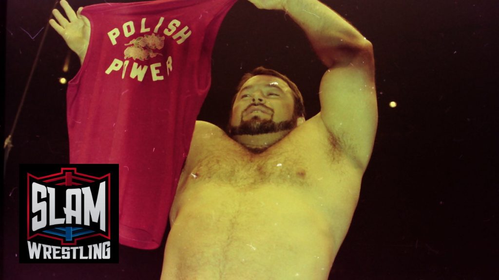 Putski holding up a Polish Power t-shirt. Photo by John Arezzi