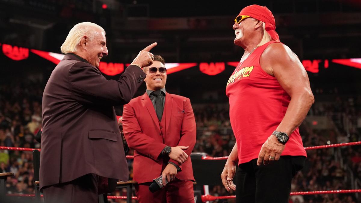 Ric Flair, The Miz and Hulk Hogan in a WWE ring. WWE photo