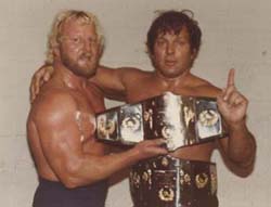 Roger Kirby and Paul Christy as WWA tag team champions. Courtesy www.rasslinrelics.com