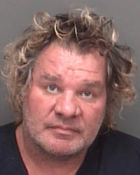 A 2004 mug shot of "Dirty" Dick Slater after another brush with the law.