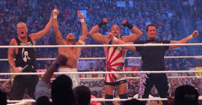 E-C-Dub! E-C-Dub! E-C-Dub! A victorious Sandman, Sabu, Rob Van Dam and Tommy Dreamer at WrestleMania 23 in Detroit. Photo by Mike Mastrandrea