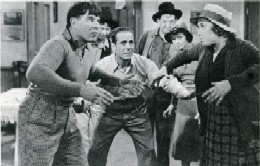 Nat Pendleton, Humphrey Bogart and Louise Fazenda; in the rear, Leon, Frank & Elviry Weaver can be seen, and Penny Singleton is to the right.