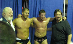 Larry Hennig with his grandson, Joe, and Ted DiBiase Jr. with his father, Ted Sr., at a WLW show in Waterloo, Iowa, in July 2007. Photo by Greg Oliver.