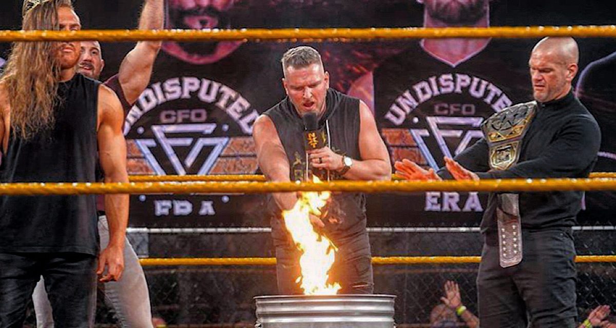 NXT: Pat McAfee sets Undisputed ERA flag ablaze