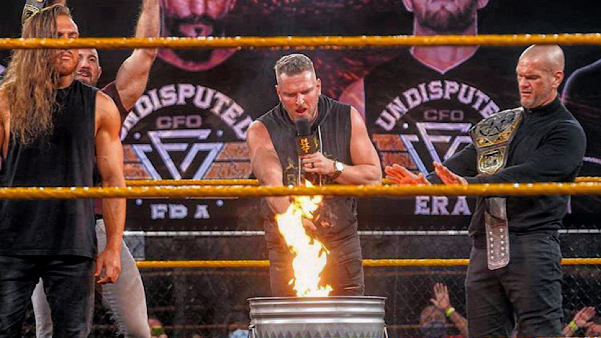 NXT: Pat McAfee sets Undisputed ERA flag ablaze