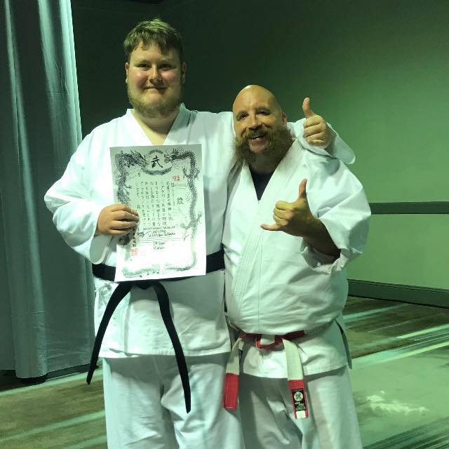 Jeremy Elliott with his godson William at the Sport Karate Museum in Texas. Photo courtesy of Jeremy Elliott.