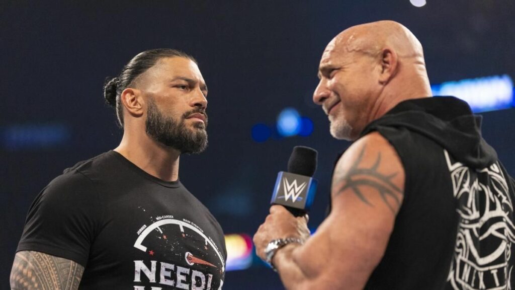 Goldberg and Roman Reigns in February 2022.
