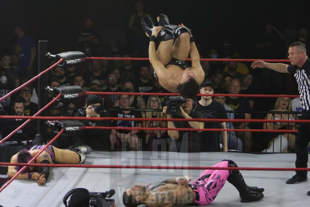 Mike Bailey flips onto Laredo Kid on Impact Wrestling, airing on April 21, 2022, taped in Philadelphia at the 2300 Arena. Photo by George Tahinos, https://georgetahinos.smugmug.com