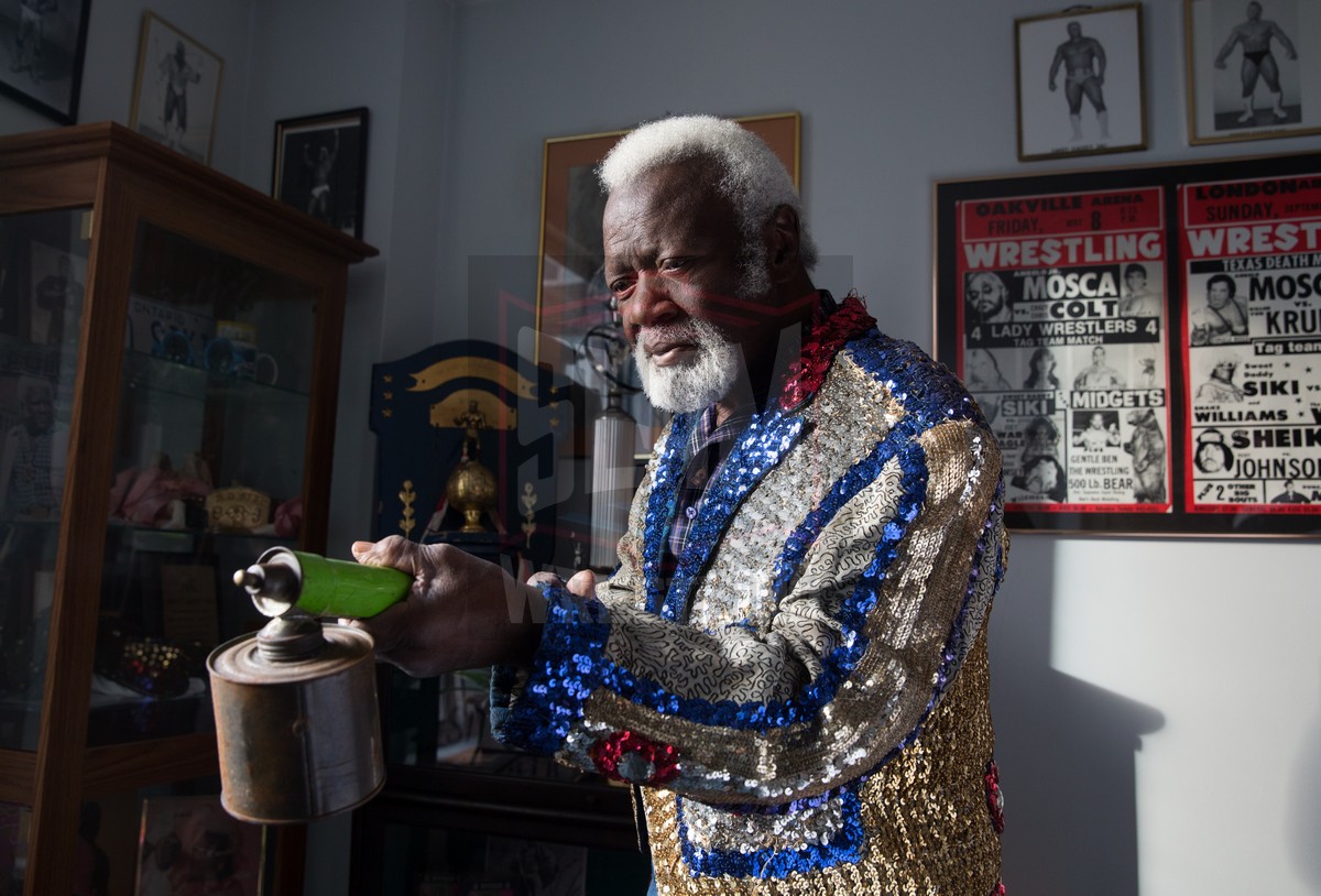 Sweet Daddy Siki with an atomizer in his apartment during the shooting of his documentary in 2016.