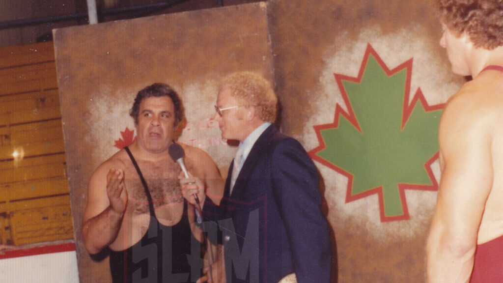 Angelo Mosca is interviewed on Maple Leaf Wrestling by Billy Red Lyons as Dewey Robertson looks on. Terry Dart photo