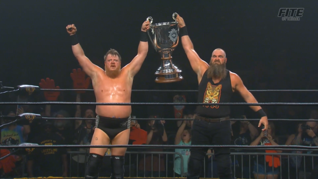 Trevor Murdoch and Mike Knox hold aloft The Crockett Cup.