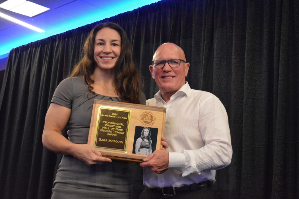 Sara McMann and Museum Director Jim Miller at the Tragos/Thesz Professional Wrestling Hall of Fame induction on Saturday, July 22, 2023, in Waterloo, Iowa. Photo by Joyce Paustian