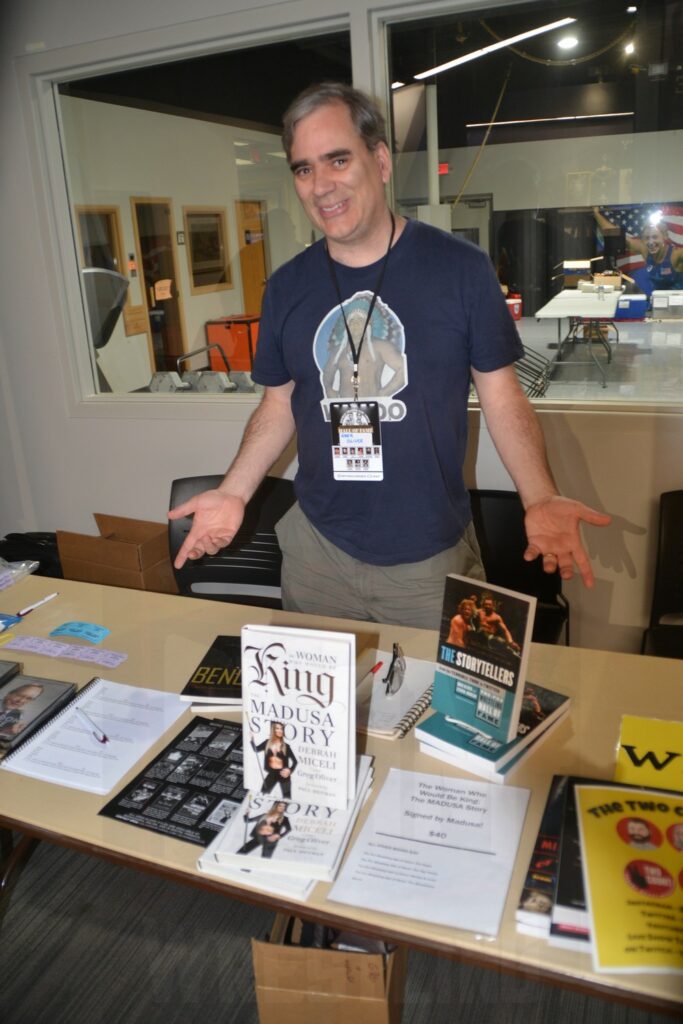 Greg Oliver and his books at the Tragos/Thesz Professional Wrestling Hall of Fame induction weekend on Friday, July 21, 2023, in Waterloo, Iowa. Photo by Wayne Palmer