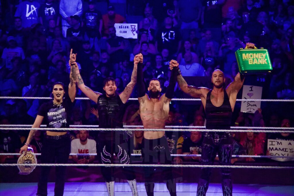 Judgement Day -- Rhea Ripley, Dominik Mysterio, Finn Balor and Damien Priest -- at the KeyBank Center in Buffalo, New York, on Monday, July 10, 2023, as WWE presented Monday Night Raw. Photo by Steve Argintaru, Twitter: @stevetsn Instagram: @stevetsn