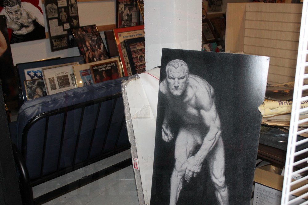 Artifacts and collectibles in the basement of the National Wrestling Hall of Fame Dan Gable Museum, in Waterloo, Iowa, on Saturday, July 22, 2023. Photo by Greg Oliver