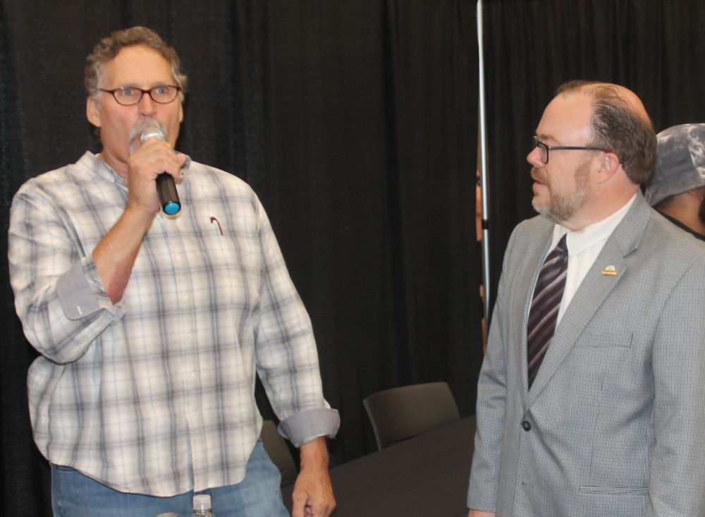 John Nord -- Nord the Barbarian / The Berserker -- with announcer Chad Olson at the Wrestling Hall of Fame induction weekend on Friday, July 21, 2023 in Waterloo, Iowa. Photo by Greg Oliver