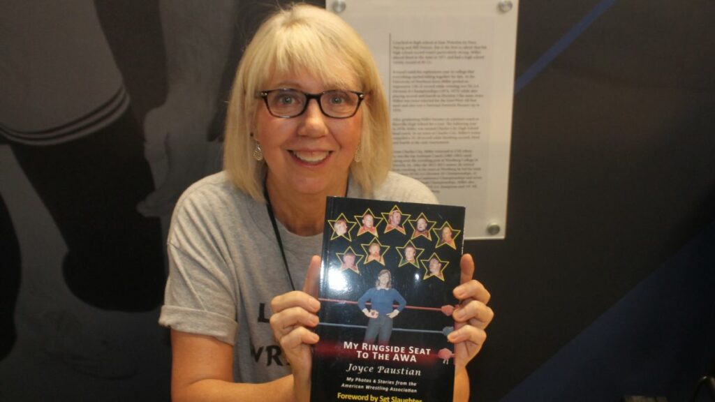 Joyce Paustian with her book, My Ringside Seat to the AWA, at the Tragos/Thesz Professional Wrestling Hall of Fame induction weekend on Friday, July 21, 2023. Photo by Greg Oliver