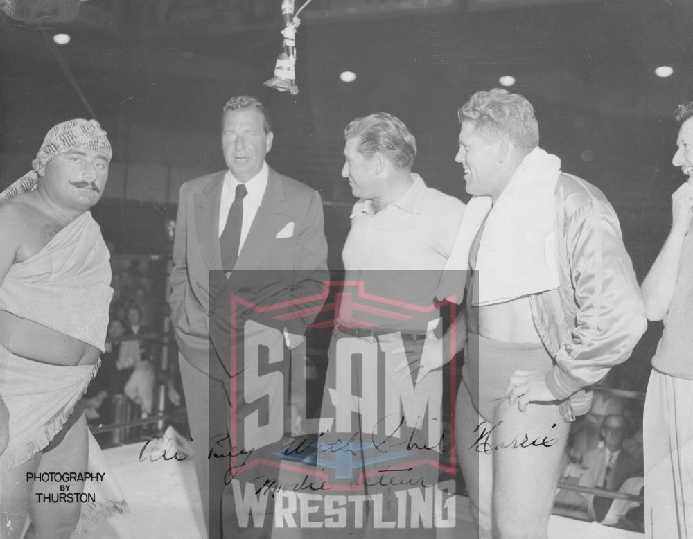Ali Bey with, left to right, actor Phil Harris, unknown, and wrestler Bud Curtis. Courtesy Stefanides family, photo by Thurston