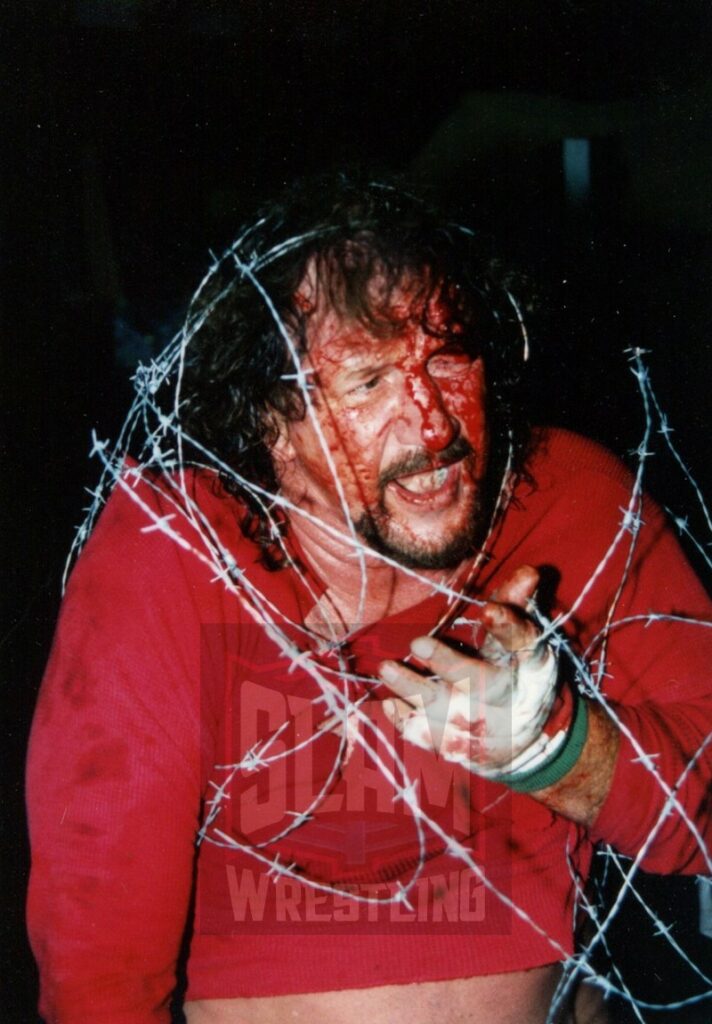 Terry Funk in barbed wire. Photo by George Tahinos, georgetahinos.smugmug.com