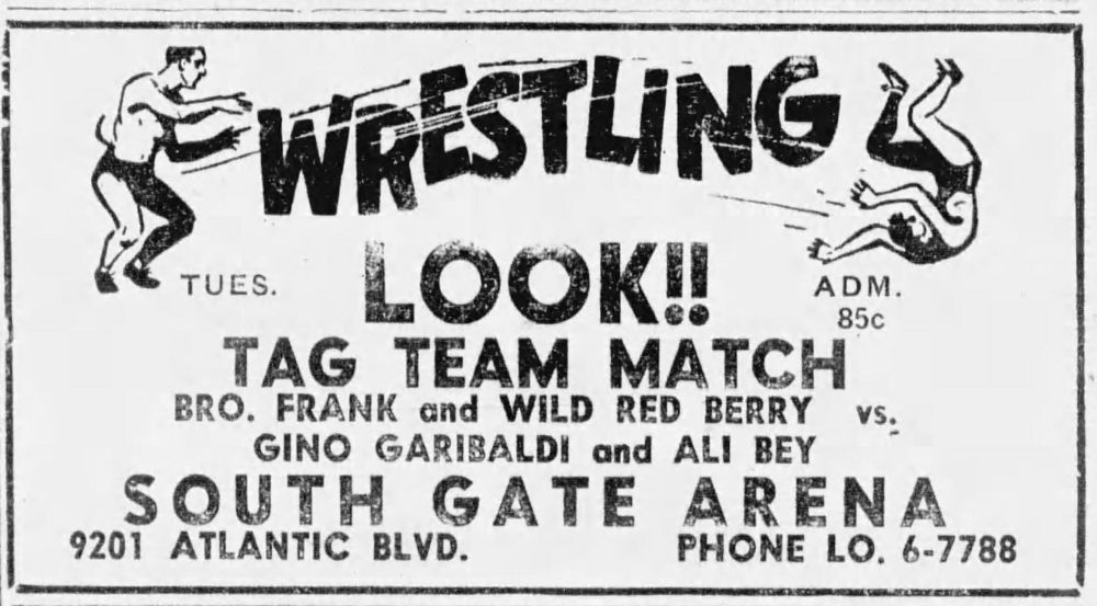 A tag team match is the main event at the South Gate Arena in Los Angeles on July 9, 1951.