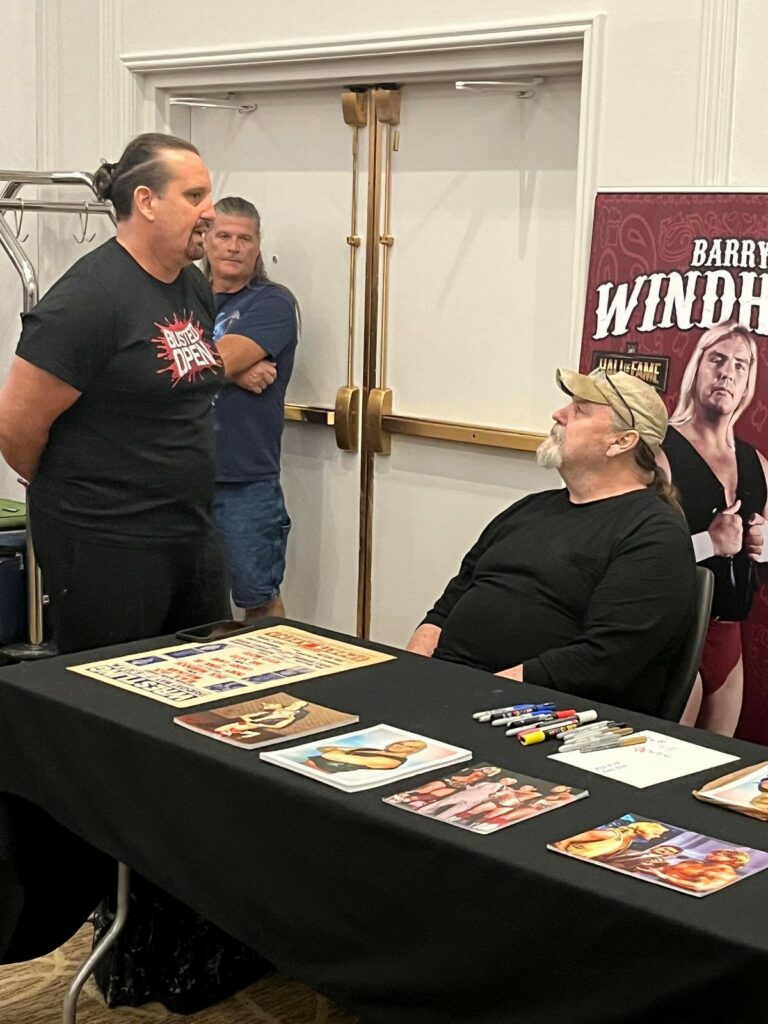 Tommy Dreamer talks with Barry Windham at The Gathering in Charlotte, NC, on Saturday, August 5, 2023. Photo by Greg "Count Grog" Mosorjak