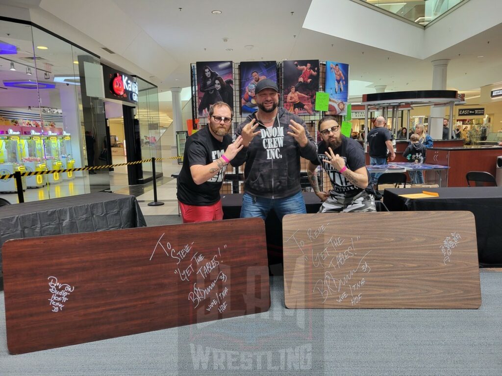 Dudley Boys sign a table at 90s Wrestling Con on Saturday, September 30, 2023, at Rockaway Townsquare, in Rockaway, New Jersey. Photo by George Tahinos, georgetahinos.smugmug.com