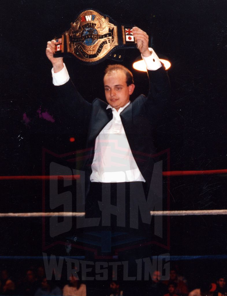 Gordon Scozzari in the ring with the AWF title belt at an AWF show. Photo by Mike Lano, WReaLano@aol.com