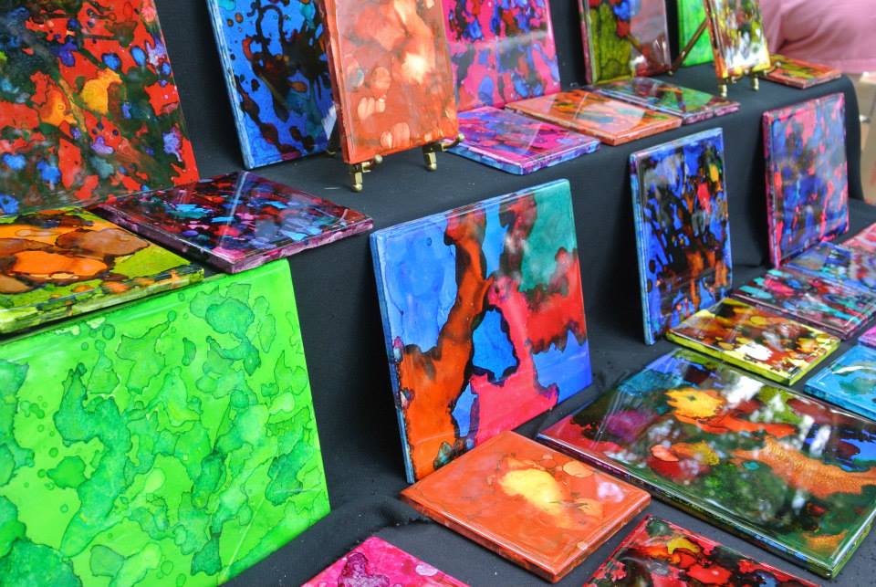 A display of Bob Aebi artwork at an art fair. Facebook photo