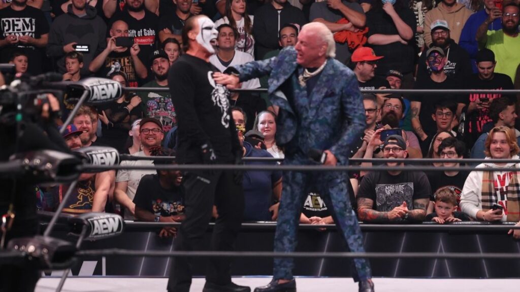 Sting gets a friendly chop from Ric Flair at AEW Dynamite, at the Liacouras Center, in Philadelphia, on Wednesday, October 25, 2023. Photo by George Tahinos, https://georgetahinos.smugmug.com