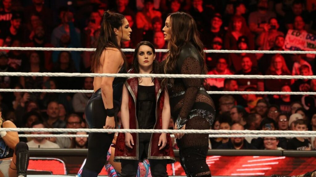 An inactive Nikki Cross stands between Raquel Rodriguez and Nia Jax in the Women’s World Championship Number One Contender Battle Royal at WWE Monday Night Raw on November 6, 2023, at the Mohegan Sun Arena at Casey Plaza in Wilkes-Barre, PA. Photo by George Tahinos, https://georgetahinos.smugmug.com