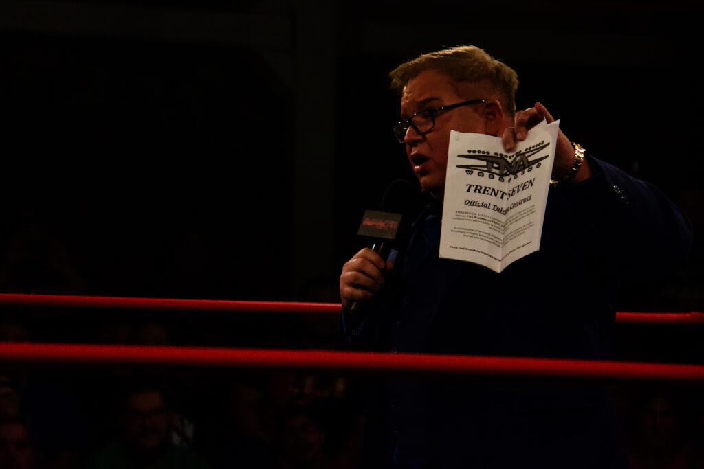 IMPACT President Scott D'Amore offers Trent Seven a TNA Wrestling contract at IMPACT Wrestling: Final Resolution at Don Kolov Arena in Mississauga, Ontario on Sat. Dec. 9, 2023. Photo by Steve Argintaru, Twitter/Instagram: @stevetsn