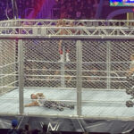 A fan gets a Christmas gift and Cody survives the cage at WWE Toronto show