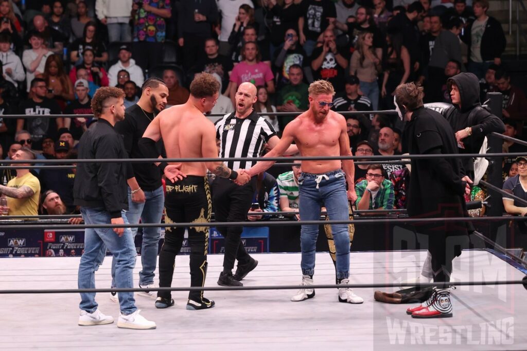 Orange Cassidy and Dante Martin shake hands at AEW Dynamite on Wednesday, January 3, 2024 at the Prudential Center in Newark, NJ. Photo by George Tahinos, https://georgetahinos.smugmug.com