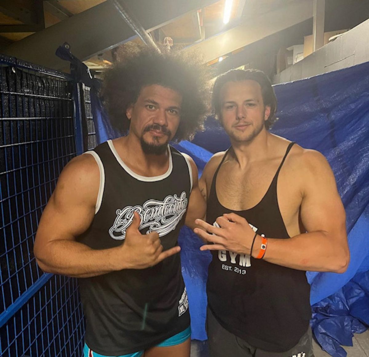 Carlito and Shawn Murphy posing for a picture.