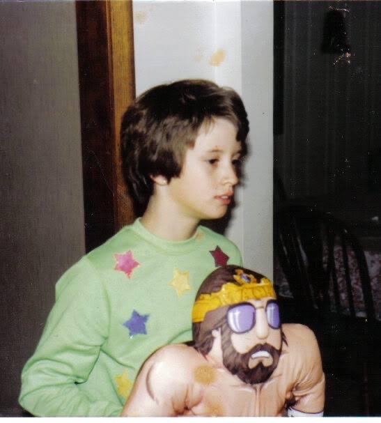 Young Carrie Canatsey with a Macho Man plushy.
