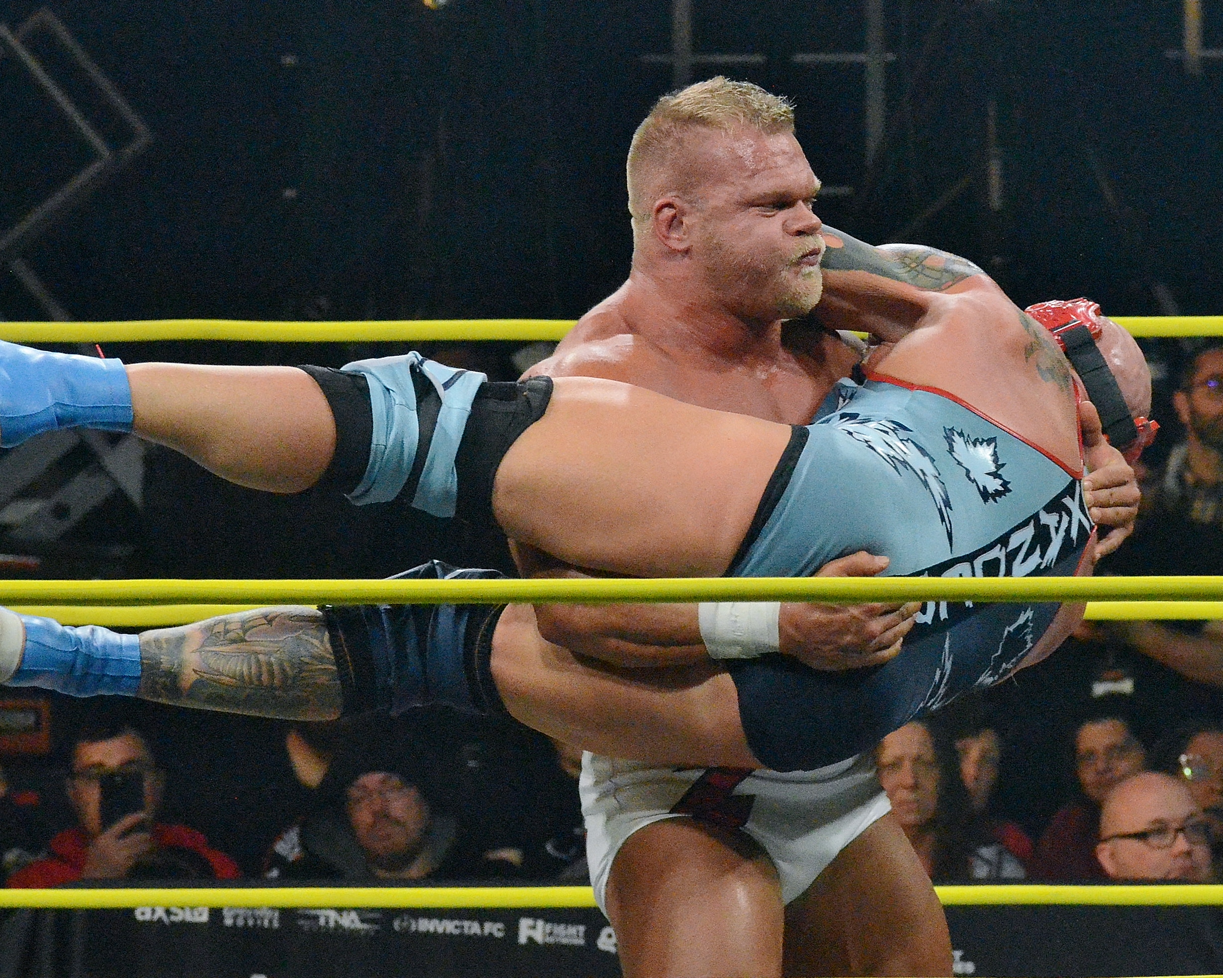 Alex Hammerstone lifts Josh Alexander at TNA Sacrifice on Friday, March 8, 2024, at St. Clair College in Windsor, Ontario. Photo by Brad McFarlin