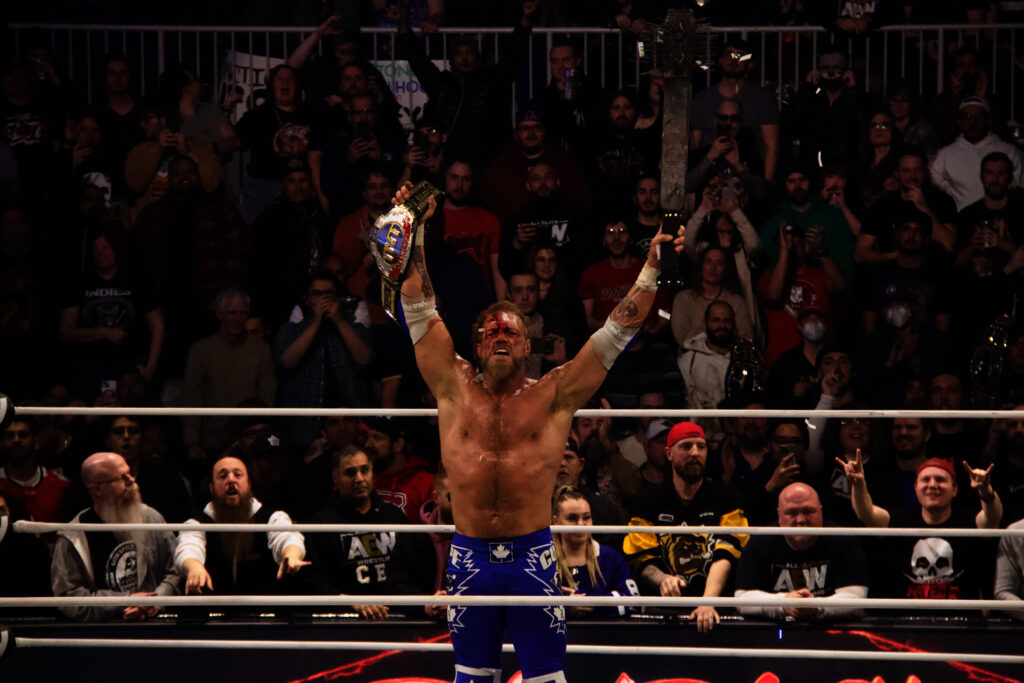 Adam Copeland celebrates his TNT Championship win at AEW Dynamite at Toronto's Coca-Cola Coliseum. Photo by Steve Argintaru Twitter/IG: @stevetsn