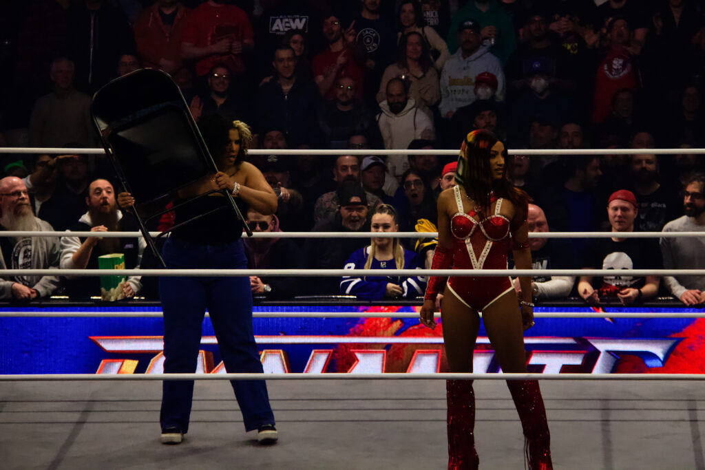 Willow appears to be contemplating hitting Mercedes Moné with a chair at AEW Dynamite at Toronto's Coca-Cola Coliseum. Photo by Steve Argintaru Twitter/IG: @stevetsn
