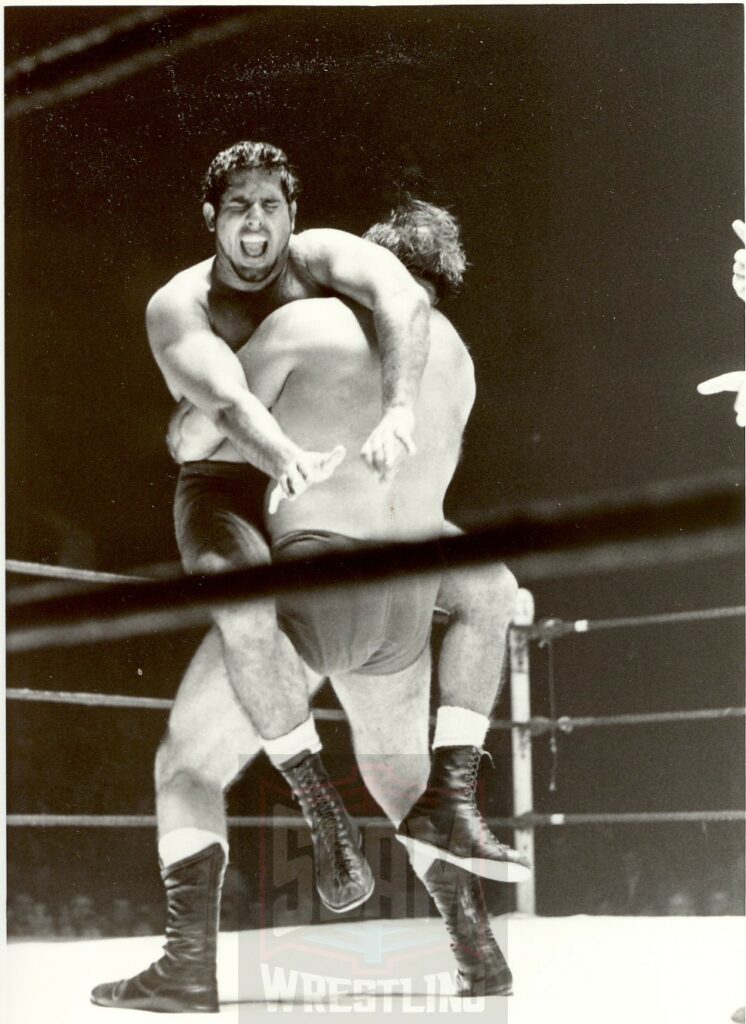 Tiger Jeet Singh struggles in the grasp of his opponent in Toronto, Ontario. Photo by Roger Baker