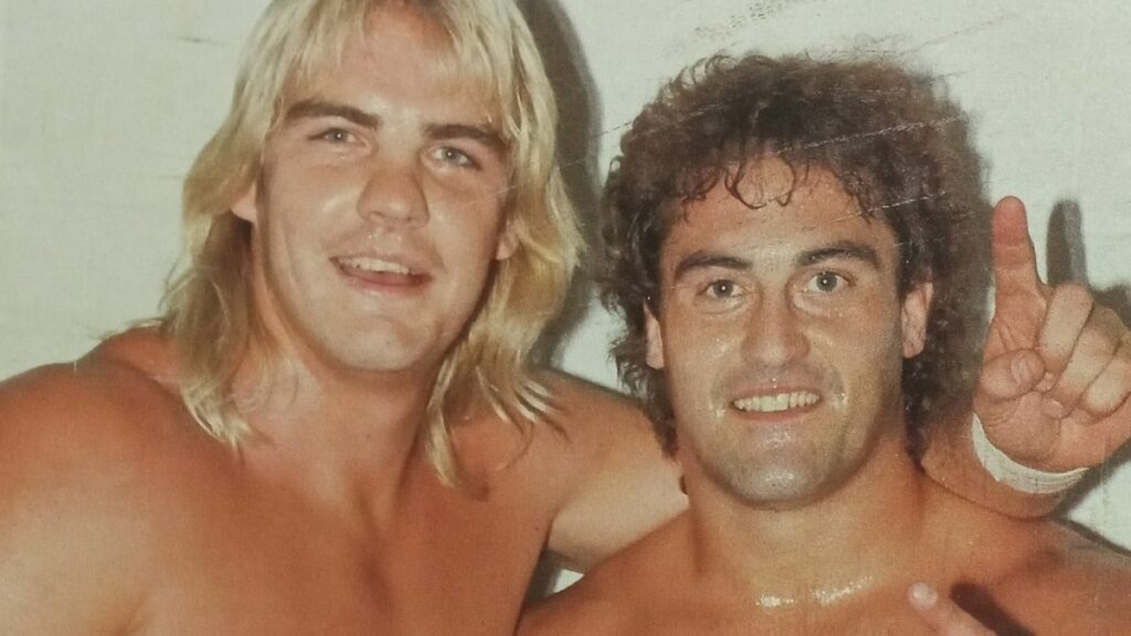 Barry Windham and Mike Rotunda from the cover of a WWF program.