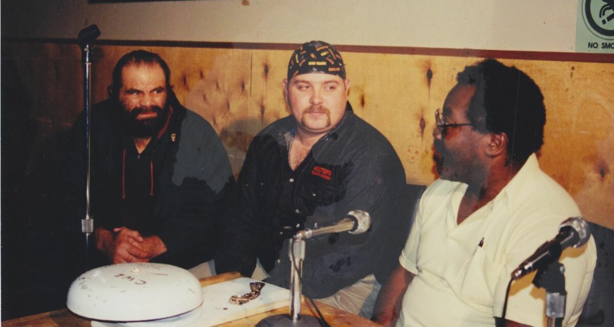 The Wolfman Willie Farkus, Justin Cassibo and Big Mac at a familiar spot at the announcers table. Terry Dart Collection