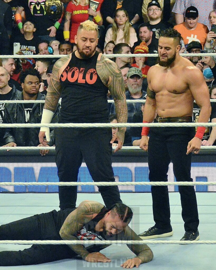Solo Sikoa and Tama Tonga stand over Jimmy Uso at WWE Smackdown at the Little Caesars Arena in Detroit, Michigan, on Friday, April 12, 2024. Photo by Brad McFarlin