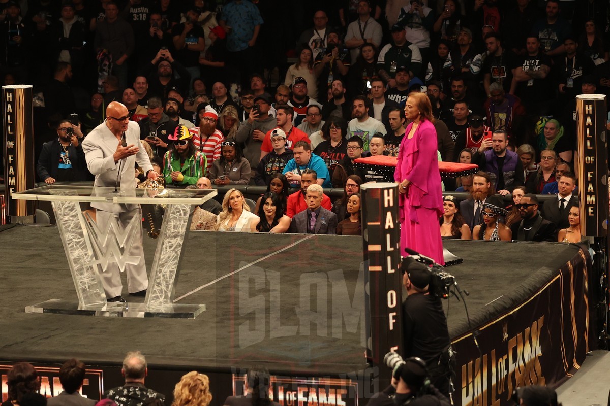 The Rock receives a People's Champion belt from Muhammad Ali's widow, Lonnie Ali, at the WWE Hall of Fame ceremony at the Wells Fargo Center in Philadelphia, PA, on Friday, April 5, 2024. Photo by George Tahinos, georgetahinos.smugmug.com