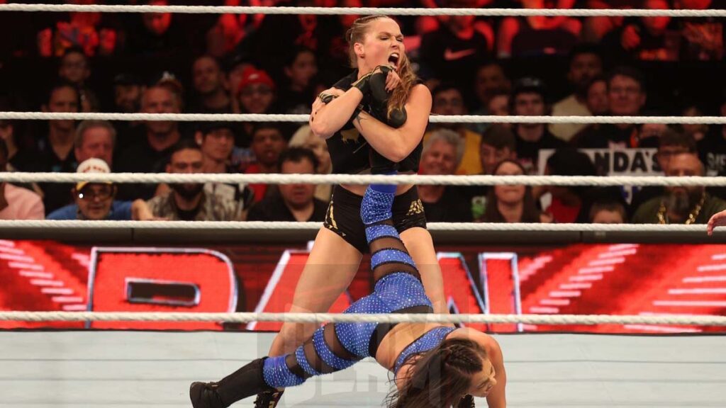 TOP PHOTO: Ronda Rousey & Shayna Baszler (C) Vs. Katana Chance & Kayden Carter in a Women's Tag Team title match at WWE Monday Night Raw, at XL Center, in Hartford, CT, on Monday, June 5, 2023. Photo by George Tahinos, Slam Wrestling, https://georgetahinos.smugmug.com