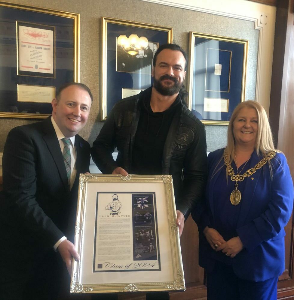 Bradley Craig, wrestling historian and founder of the Hall, with Drew McIntyre and Glasgow’s Lord Provost Jacqueline McLaren on June 13, 2024, at Edmiston House in Glasgow, Scotland.