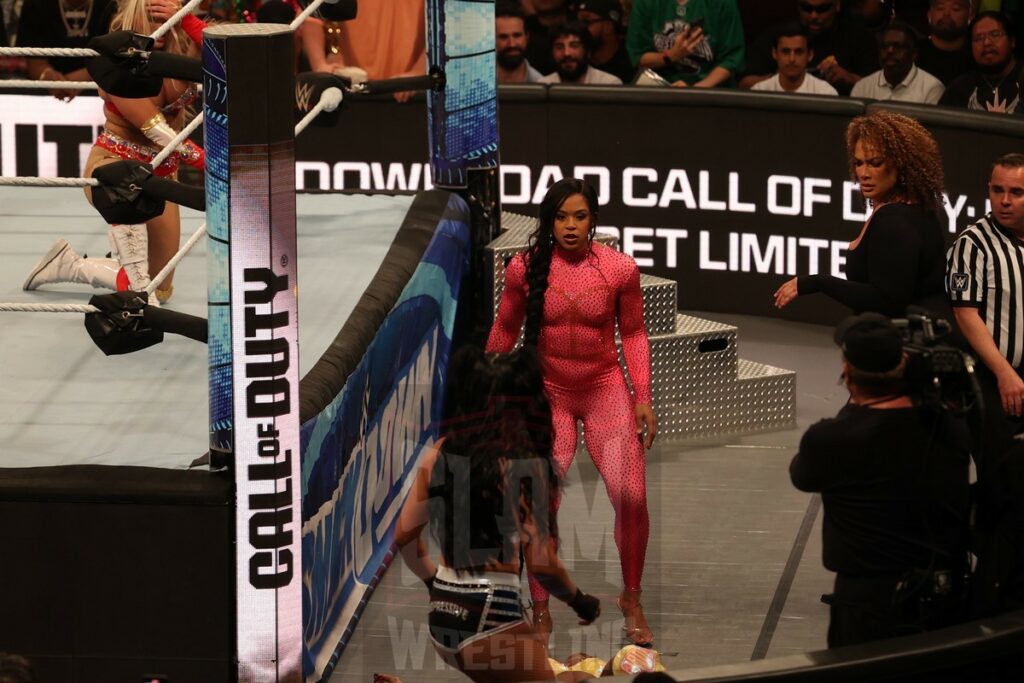 Bianca Belair, Indi Hartwell and Nia Jax at ringside during the Money in the Bank Qualifying match between Candice LeRae vs. Tiffany Stratton vs. Jade Cargill at Madison Square Garden, in New York City, NY, on Friday, June 28, 2024, as WWE presented Smackdown. Photo by George Tahinos, georgetahinos.smugmug.com