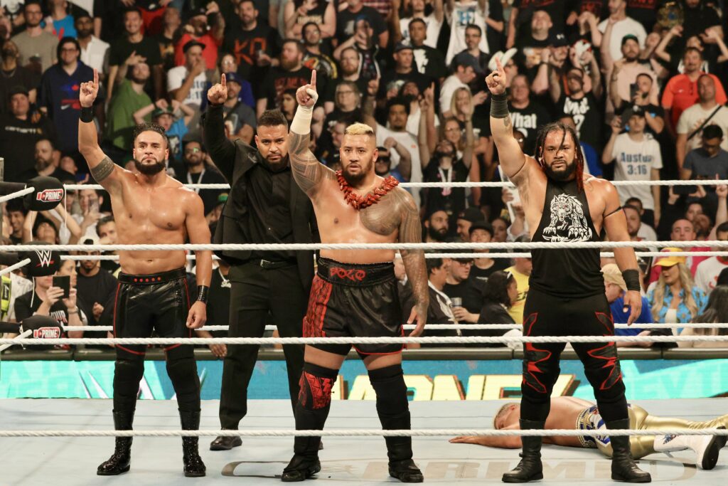 A victorious Bloodline poses in the ring at the Money in the Bank PLE on Saturday, July 6, 2024, at Scotiabank Arena in Toronto. Photo by Steve Argintaru, Twitter/IG: @stevetsn