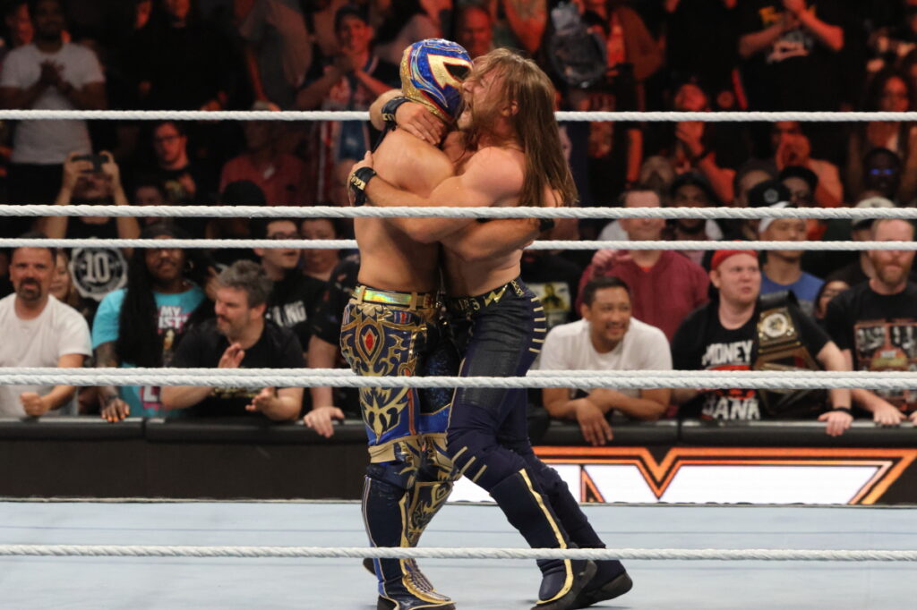 NXT Tag Team Champions Axiom & Nathan Frazer hug it out after retaining their belts vs. Chase U at NXT Heatwave on Sunday, July 7, 2024, at Scotiabank Arena in Toronto. Photo by Steve Argintaru, Twitter/IG: @stevetsn